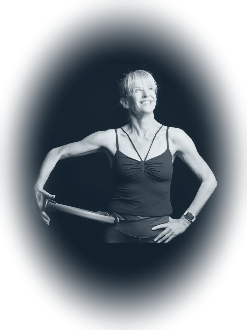 Florence smiling, holding a Pilates magic circle